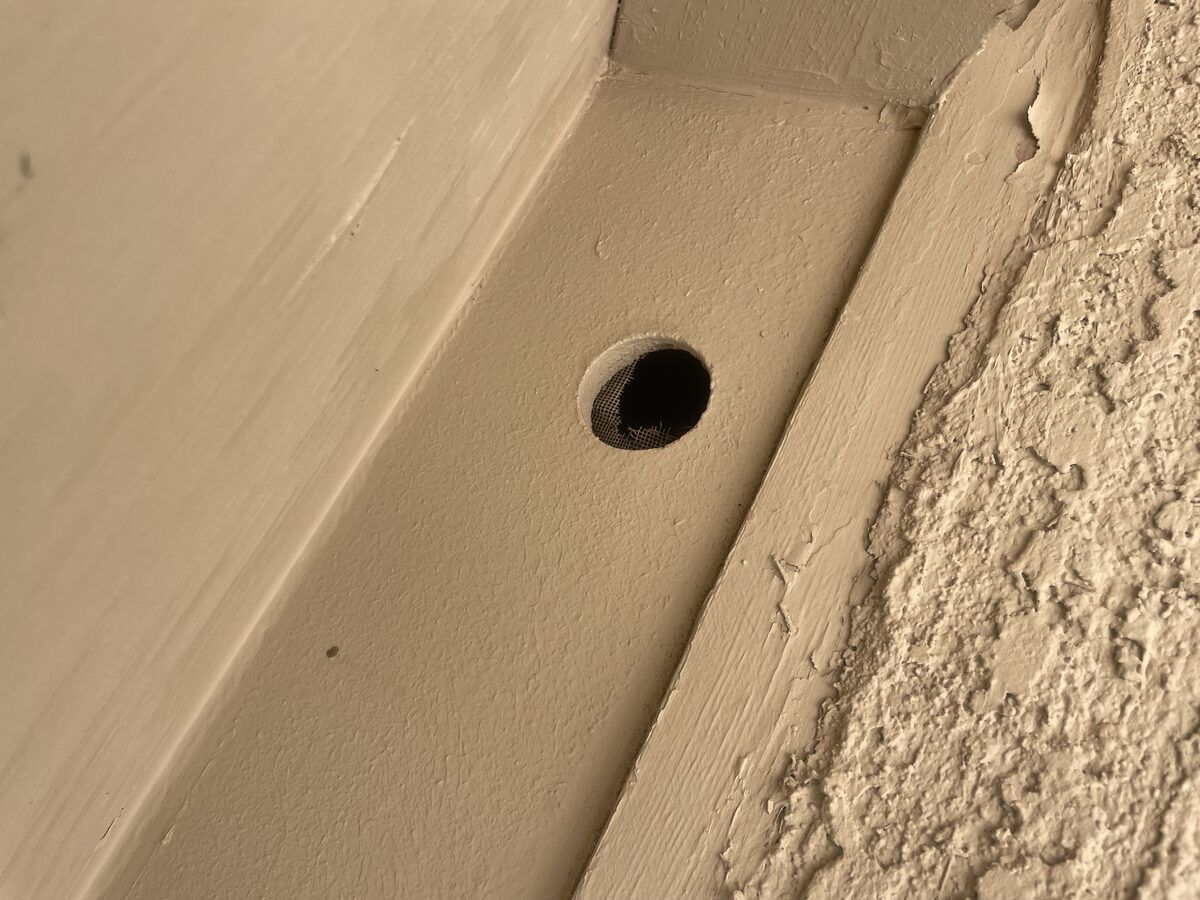 Rodent exclusion door sweep and weather seal installation